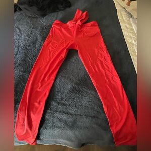 Red leggings.